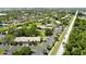 Overhead view of the community featuring beautiful landscaping, parking areas and nearby roadways at 1515 Forrest Nelson Blvd # D102, Port Charlotte, FL 33952