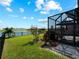 The backyard offers scenic views of the pond, as well as plenty of green space at 15974 Clear Skies Pl, Bradenton, FL 34211