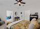Spacious bedroom featuring a ceiling fan and a dresser at 15974 Clear Skies Pl, Bradenton, FL 34211