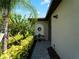 Landscaped front entrance with a stone walkway and decorative wreath at 15974 Clear Skies Pl, Bradenton, FL 34211