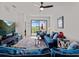 Inviting living room featuring outdoor view through the glass doors to the patio at 15974 Clear Skies Pl, Bradenton, FL 34211