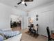 Bright living room area that opens to dining area with tiled floor and ceiling fan at 15974 Clear Skies Pl, Bradenton, FL 34211