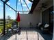 Screened lanai with pavers, ceiling fan, comfortable seating and backyard views at 15974 Clear Skies Pl, Bradenton, FL 34211