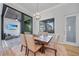 Dining area with outdoor access, comfortable seating for six, and lots of natural light at 1801 Los Alamos Dr, Punta Gorda, FL 33950