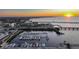 Amazing waterfront view featuring a beautiful sunset and marina at 1801 Los Alamos Dr, Punta Gorda, FL 33950