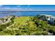 Breathtaking view of waterfront park with playground and lush landscaping at 1801 Los Alamos Dr, Punta Gorda, FL 33950