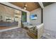 Relaxing outdoor space featuring comfortable seating, and a sliding door into the living room at 1801 Los Alamos Dr, Punta Gorda, FL 33950