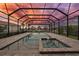 Enjoy this beautiful pool with screened enclosure, brick pool deck and ample space for entertaining at 1801 Los Alamos Dr, Punta Gorda, FL 33950