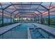 Enjoy this beautiful pool with screened enclosure, brick pool deck and ample space for entertaining at 1801 Los Alamos Dr, Punta Gorda, FL 33950