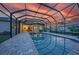 Enjoy this beautiful pool with screened enclosure, brick pool deck and ample space for entertaining at 1801 Los Alamos Dr, Punta Gorda, FL 33950