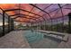 Enjoy this beautiful pool with screened enclosure, brick pool deck and ample space for entertaining at 1801 Los Alamos Dr, Punta Gorda, FL 33950