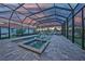 Enjoy this beautiful pool with screened enclosure, brick pool deck and ample space for entertaining at 1801 Los Alamos Dr, Punta Gorda, FL 33950