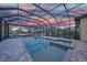 Enjoy this beautiful pool with screened enclosure, brick pool deck and ample space for entertaining at 1801 Los Alamos Dr, Punta Gorda, FL 33950