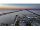 Stunning waterfront view with a pier, a restaurant, and multiple bridges at 1801 Los Alamos Dr, Punta Gorda, FL 33950