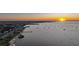 Amazing waterfront view with a pier and a golden sunset at 1801 Los Alamos Dr, Punta Gorda, FL 33950