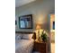 Comfortable bedroom featuring a plush bed and an ensuite bathroom entrance at 2023 Lynx Run, North Port, FL 34288