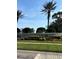 Bobcat Trail community entrance with well-maintained landscaping at 2023 Lynx Run, North Port, FL 34288