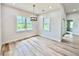 Bright dining room with large windows and modern lighting at 2089 Garnet St, North Port, FL 34288