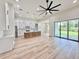 Bright and airy living space with high ceilings and ample natural light from large sliding doors at 2089 Garnet St, North Port, FL 34288