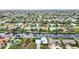 Aerial view of a waterfront community featuring numerous canals at 2160 Aqui Esta Dr, Punta Gorda, FL 33950