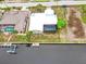 Aerial shot of a waterfront home featuring a screened lanai, pool and private dock at 2160 Aqui Esta Dr, Punta Gorda, FL 33950