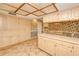 Spacious kitchen featuring abundant cabinet space and an eat-in dining area at 2160 Aqui Esta Dr, Punta Gorda, FL 33950