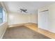 Spacious living room with hardwood floors, a ceiling fan, and plenty of natural light at 22481 Westchester Blvd # B48, Punta Gorda, FL 33980