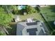 A view of the solar panels on the roof and the pool in the backyard at 23273 Abeline Ave, Punta Gorda, FL 33980