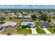 Beautiful aerial view of a landscaped home, showcasing its well-manicured lawn and surrounding residential neighborhood at 25371 Paladin Ln, Punta Gorda, FL 33983