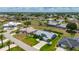 Idyllic aerial shot of home highlighting its meticulously maintained lawn and charming neighborhood at 25371 Paladin Ln, Punta Gorda, FL 33983
