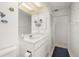 Bathroom featuring a modern vanity and decorative aquatic themed decor at 25371 Paladin Ln, Punta Gorda, FL 33983