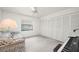 Spare bedroom featuring a window and ample closet space at 25371 Paladin Ln, Punta Gorda, FL 33983