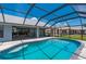 Inviting screened-in pool offers a refreshing oasis for relaxation and enjoyment at 25371 Paladin Ln, Punta Gorda, FL 33983