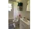 Standard bathroom featuring a toilet, vanity, and shower/tub combination at 28024 Cleveland Ave, Punta Gorda, FL 33982