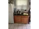 Kitchen counter space with drawers and white refrigerator at 28024 Cleveland Ave, Punta Gorda, FL 33982
