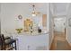 Eat-in kitchen bar featuring tile floor and open floor plan at 3322 Hampton St, Port Charlotte, FL 33948