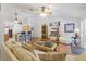 Bright and airy living room with an open concept design and a kitchen view at 3322 Hampton St, Port Charlotte, FL 33948