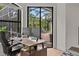 Bright office featuring a pool view, creating an inspiring and tranquil workspace within the home at 3393 S Haberland Blvd, North Port, FL 34288
