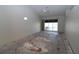 Open living area with a sliding glass door to the outside, awaiting your personal touch and design ideas at 3803 Albacete Cir # 64, Punta Gorda, FL 33950