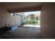 Enclosed patio overlooking landscaped yard, offering a private outdoor space for relaxation and entertainment at 3803 Albacete Cir # 64, Punta Gorda, FL 33950