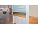 Built-in bar area, with tile backsplash and wooden countertop, located off of the dining room at 3960 Magara Ter, North Port, FL 34287
