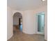 Hallway featuring curved walls and leading to living area with pool view at 3960 Magara Ter, North Port, FL 34287