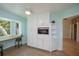 Sunny kitchen nook with built-in desk, cabinets, and backyard views at 3960 Magara Ter, North Port, FL 34287