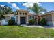Welcoming front entrance with a stylish double door and decorative stone accents at 4294 Wooley Ave, North Port, FL 34287