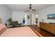 The main bedroom boasts hardwood floors, easy access to the bathroom, closet and views of the backyard at 4294 Wooley Ave, North Port, FL 34287