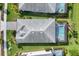 A top-down aerial shot shows the layout of the home, including the pool and the driveway at 43249 Treadway Dr, Punta Gorda, FL 33982