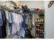 Walk-in closet featuring ample storage space with hanging rods, shelves, and organization units at 43249 Treadway Dr, Punta Gorda, FL 33982