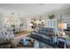 An open concept living room, dining room, and kitchen at 43249 Treadway Dr, Punta Gorda, FL 33982
