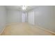 A bedroom featuring neutral paint, carpet, a ceiling fan, and a closet at 4413 S San Mateo Dr, North Port, FL 34288