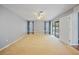 Large main bedroom with carpet flooring and ceiling fan at 4413 S San Mateo Dr, North Port, FL 34288